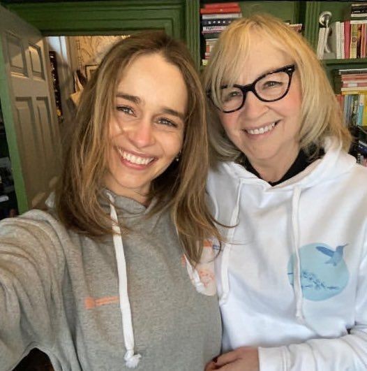 Emilia and Jenny Clarke smile at the camera